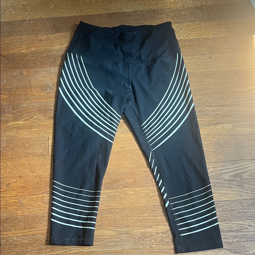 Chic Black Leggings with Gold Stripes